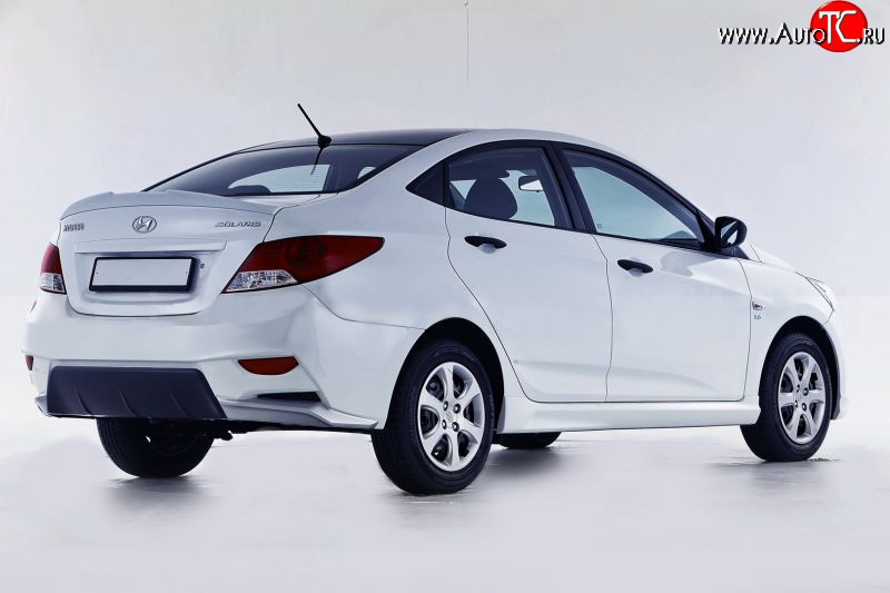 13 499 р. Задний бампер Sport  Hyundai Solaris  RBr (2010-2014) седан дорестайлинг (Неокрашенный)  с доставкой в г. Москва