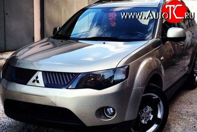 1 529 р. Темная защита передних фар SIM Mitsubishi Outlander XL (CW)  дорестайлинг (2005-2009)  с доставкой в г. Москва