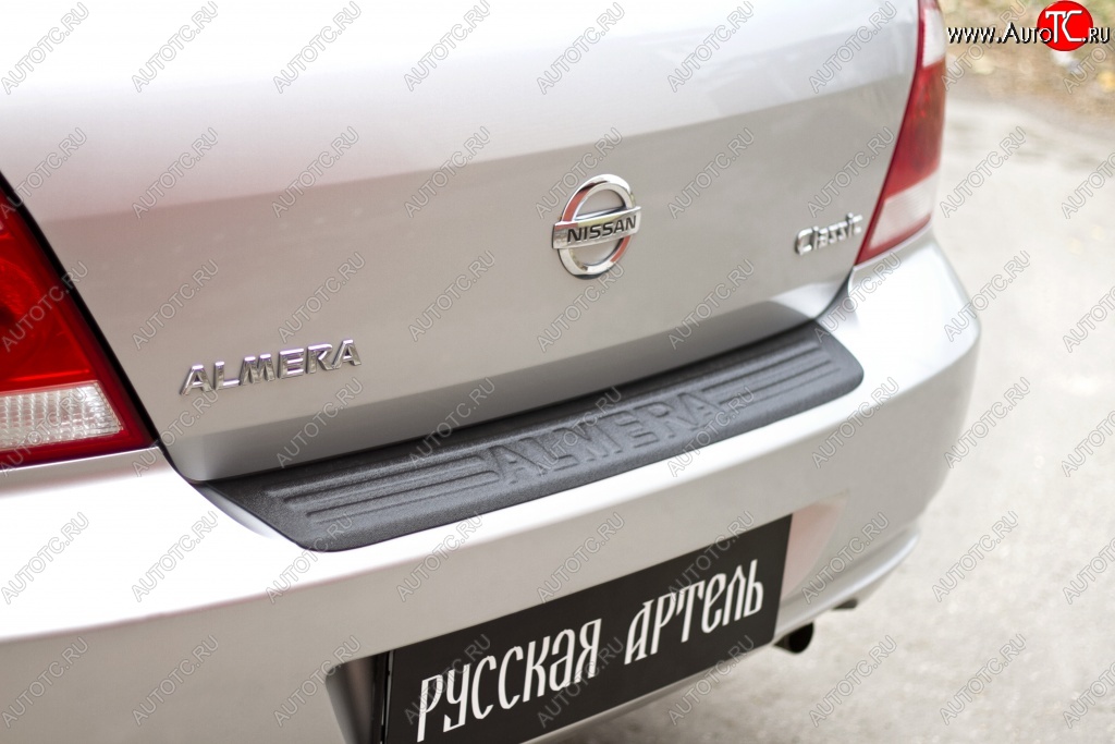 1 049 р. Накладка на задний бампер RA  Nissan Almera Classic  седан (2006-2013) B10  с доставкой в г. Москва